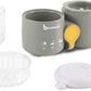 Baby food processor parts set with gray base, yellow lid, and clear containers