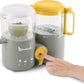 Baby food processor with two clear jars, yellow lid, and finger on the control dial