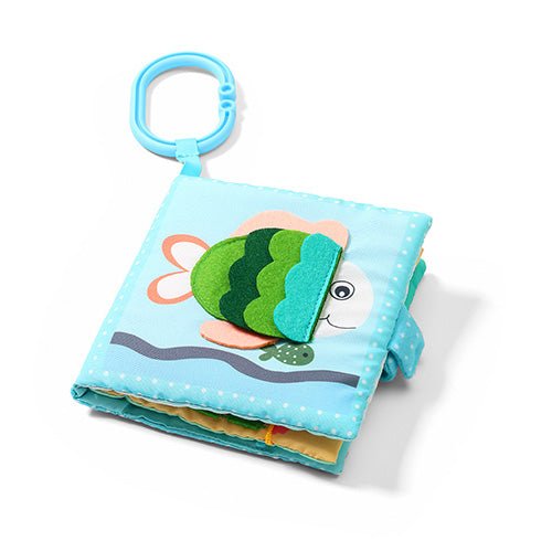 Soft sensory sea book with stitched fish face, blue carry loop, and textured pages