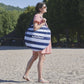 Striped babymoov carry bag for pop-up baby tent with handles