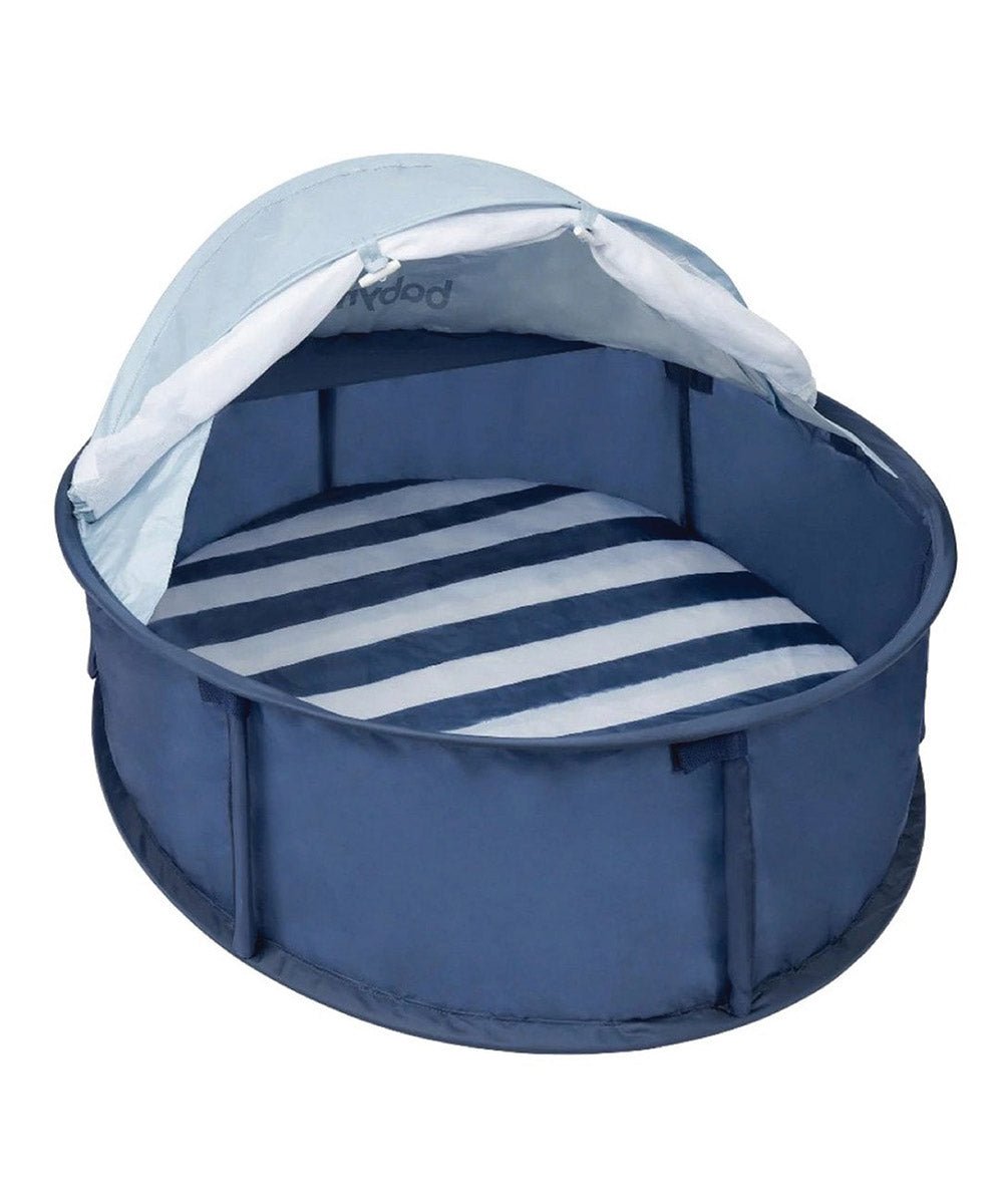 Navy baby pop-up play tent with blue-and-white striped floor and open canopy