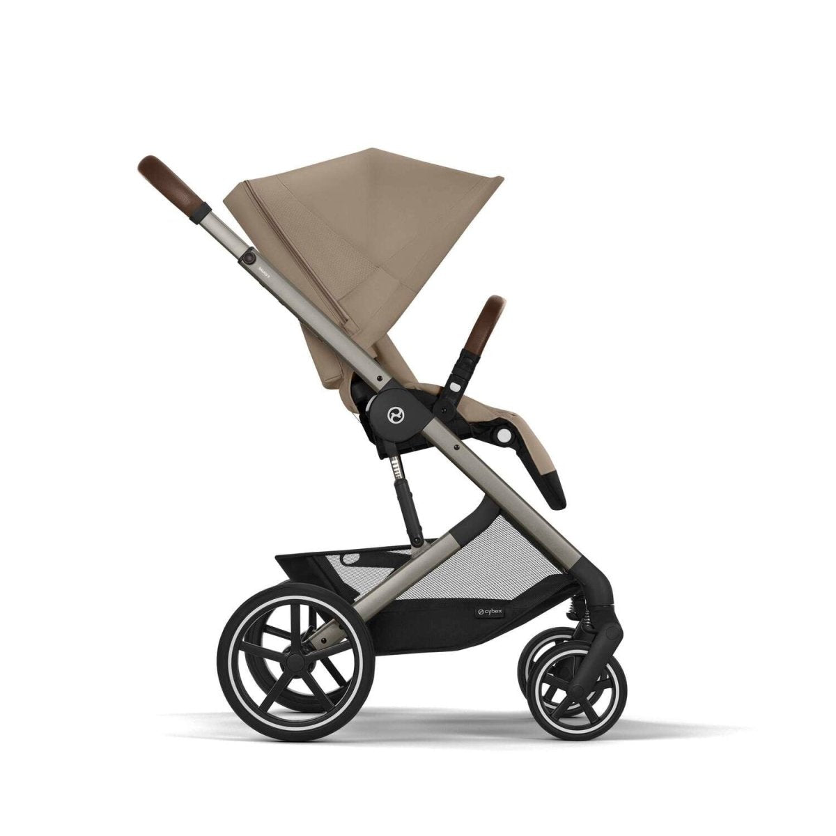 All-terrain stroller side view with beige seat, taupe canopy, and black wheel set