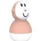 Single peach bath wobbler toy with smiling face, black eyes, and white bottom.
