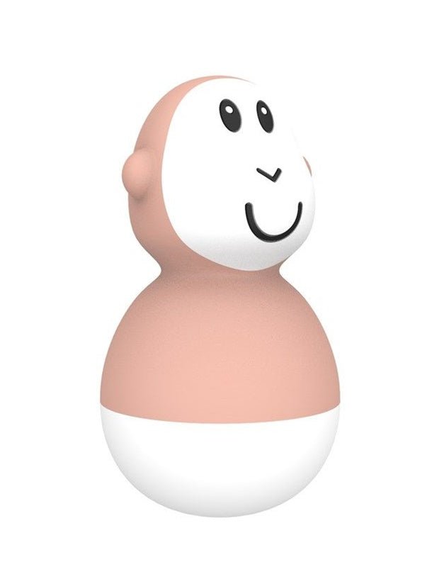 Single peach bath wobbler toy with smiling face, black eyes, and white bottom.