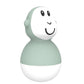 Single mint bath wobbler toy with smiling face, black eyes, and white bottom.