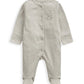 Gray knit footed sleeper with front snap buttons and small chest graphic