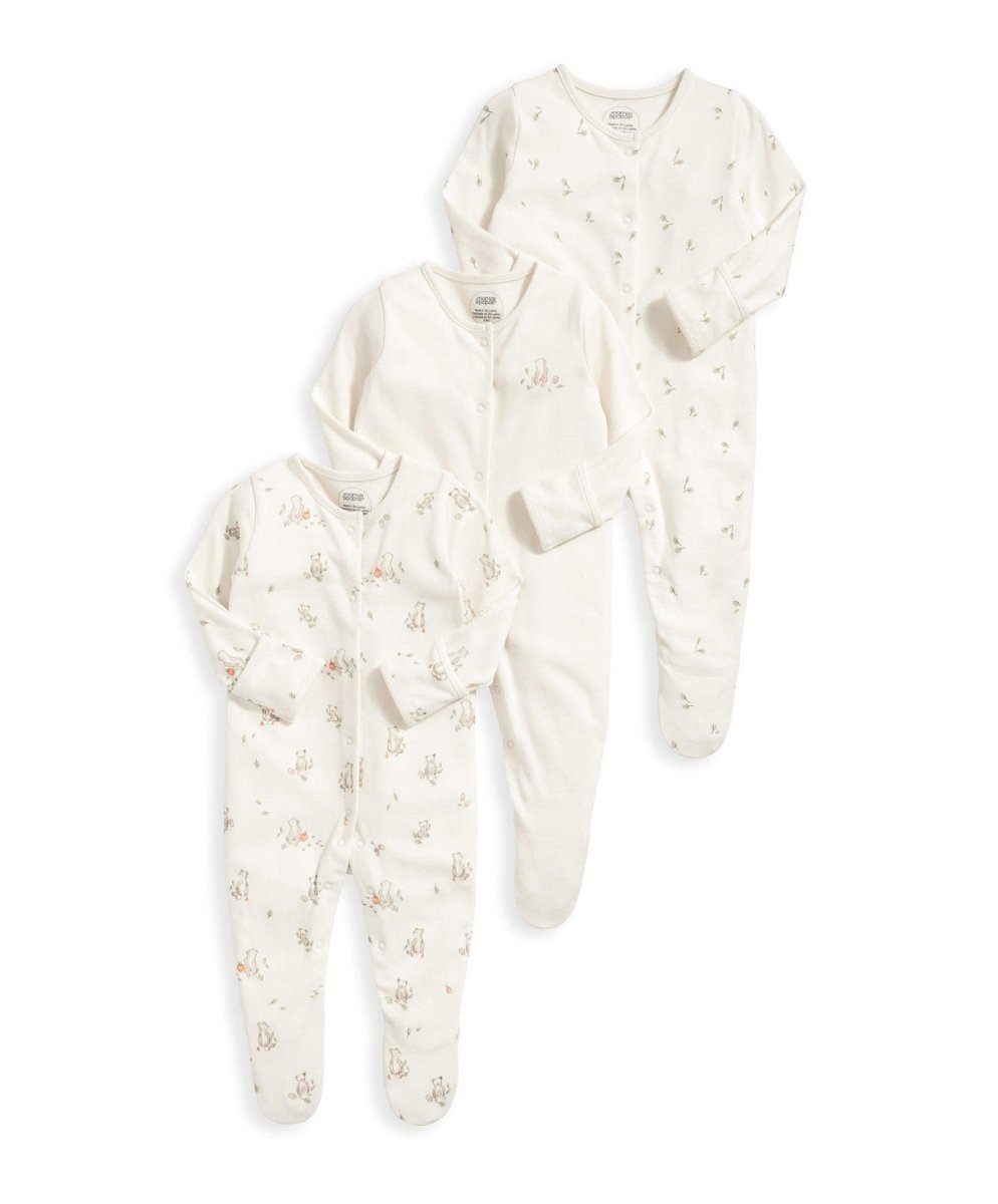 Set of three baby sleepsuits, light cream with small bear prints, footed design