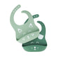 Green silicone bib with front pocket, molded silicone texture and icon print