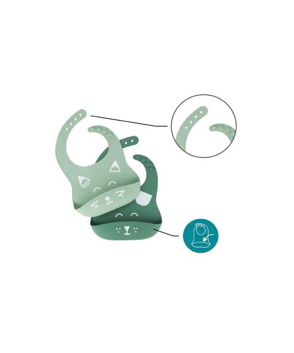Green silicone bib with front pocket, printed icons and curved neck opening