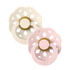 Pair of flower pacifiers in ivory and pink with gold center rings and BIBS text