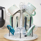 Bottle dryer with rotating arms holding clear cups and bottle inserts