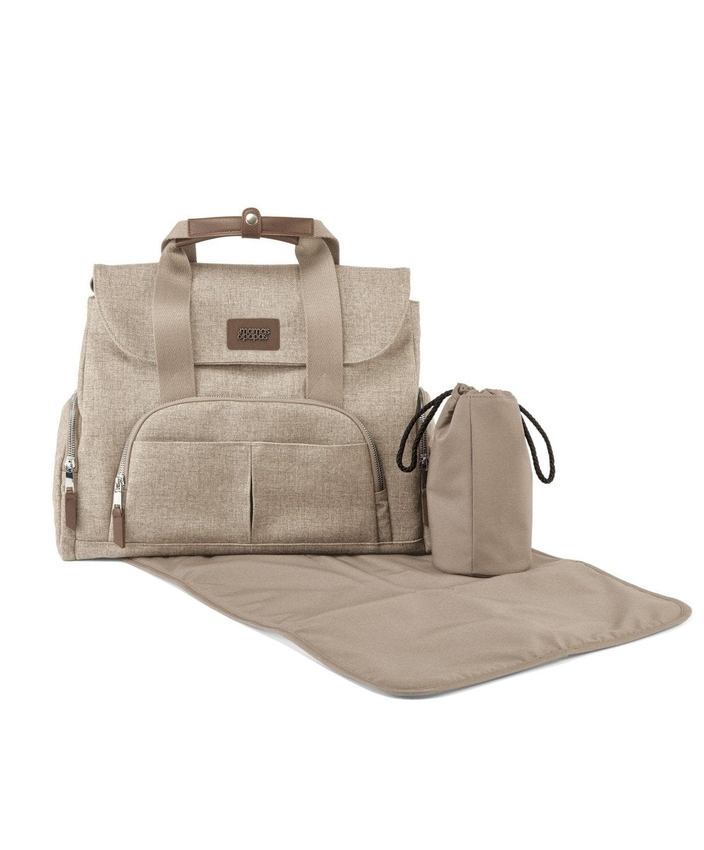 Biscuit bowler changing bag with front zip pocket, carry handle, and included changing mat