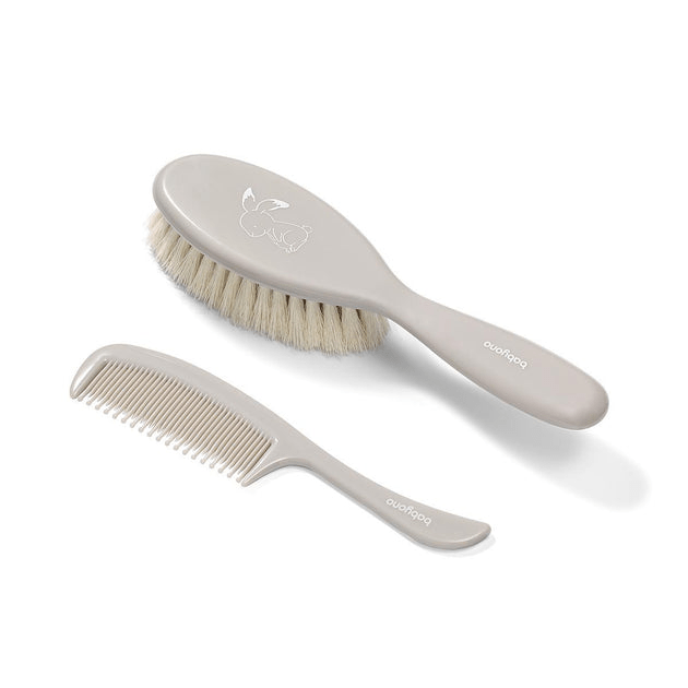 Baby hair brush and comb set with soft bristles and fine teeth, light gray
