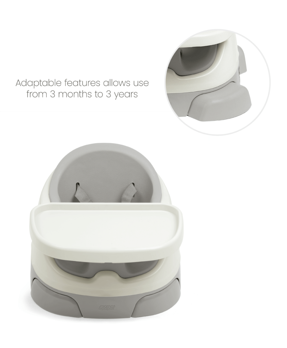 Baby booster seat with activity tray, light gray and white, front view