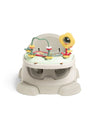 Floor booster seat with activity tray, white top and light grey base with toys