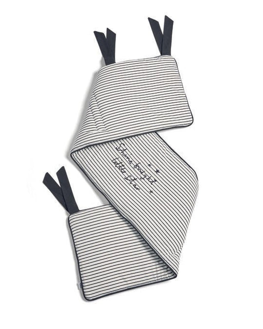 Striped baby bed bumper with tied corners, music notes and star details