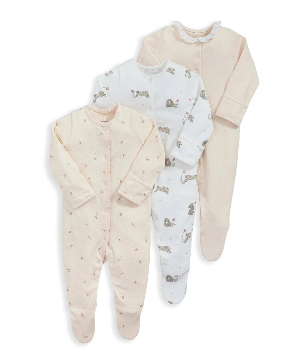 Set of three footed baby sleepsuits with all-over bunny print in white and light pink
