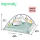 Plush baby activity gym with arched frame, padded mat, and hanging activity toys