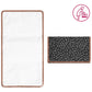 Changing mat set close-up, white mat with brown border and black speckle cover