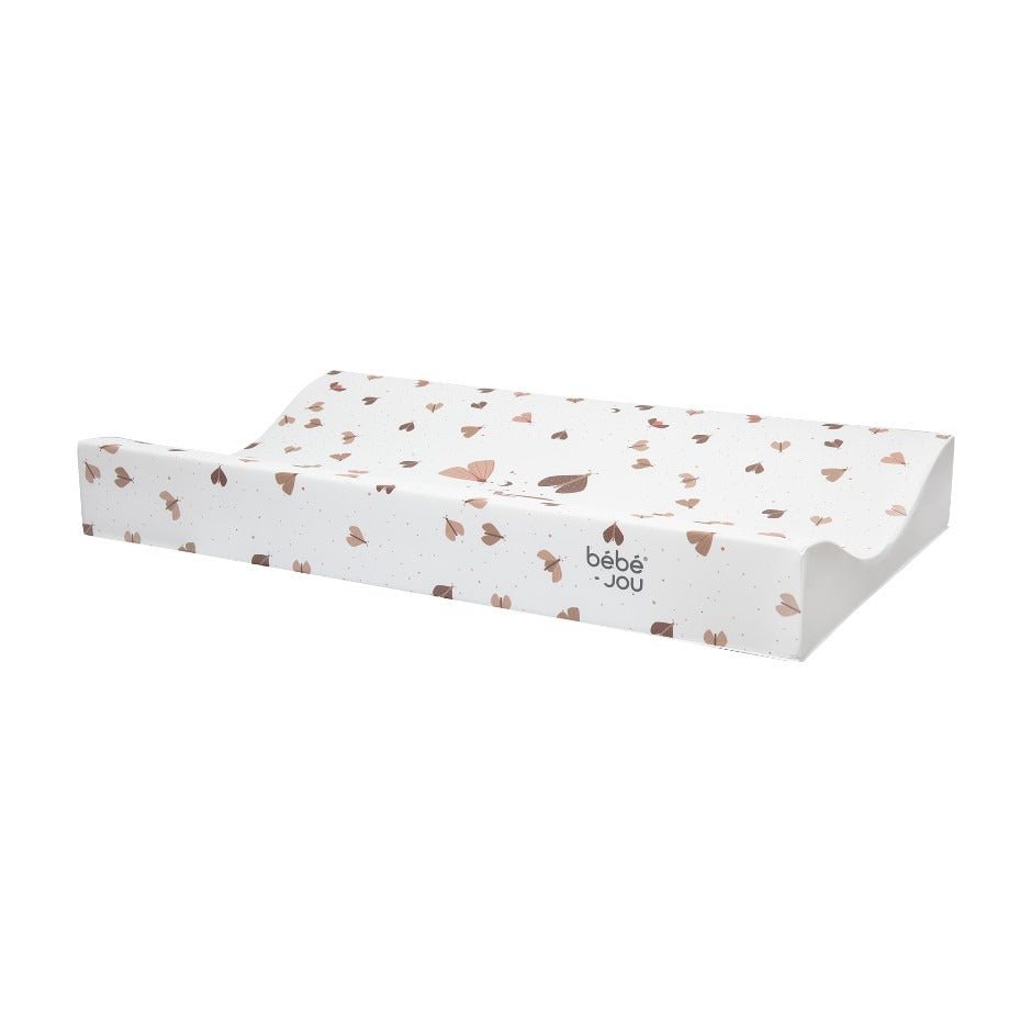 White changing pad with small neutral print and rounded edges