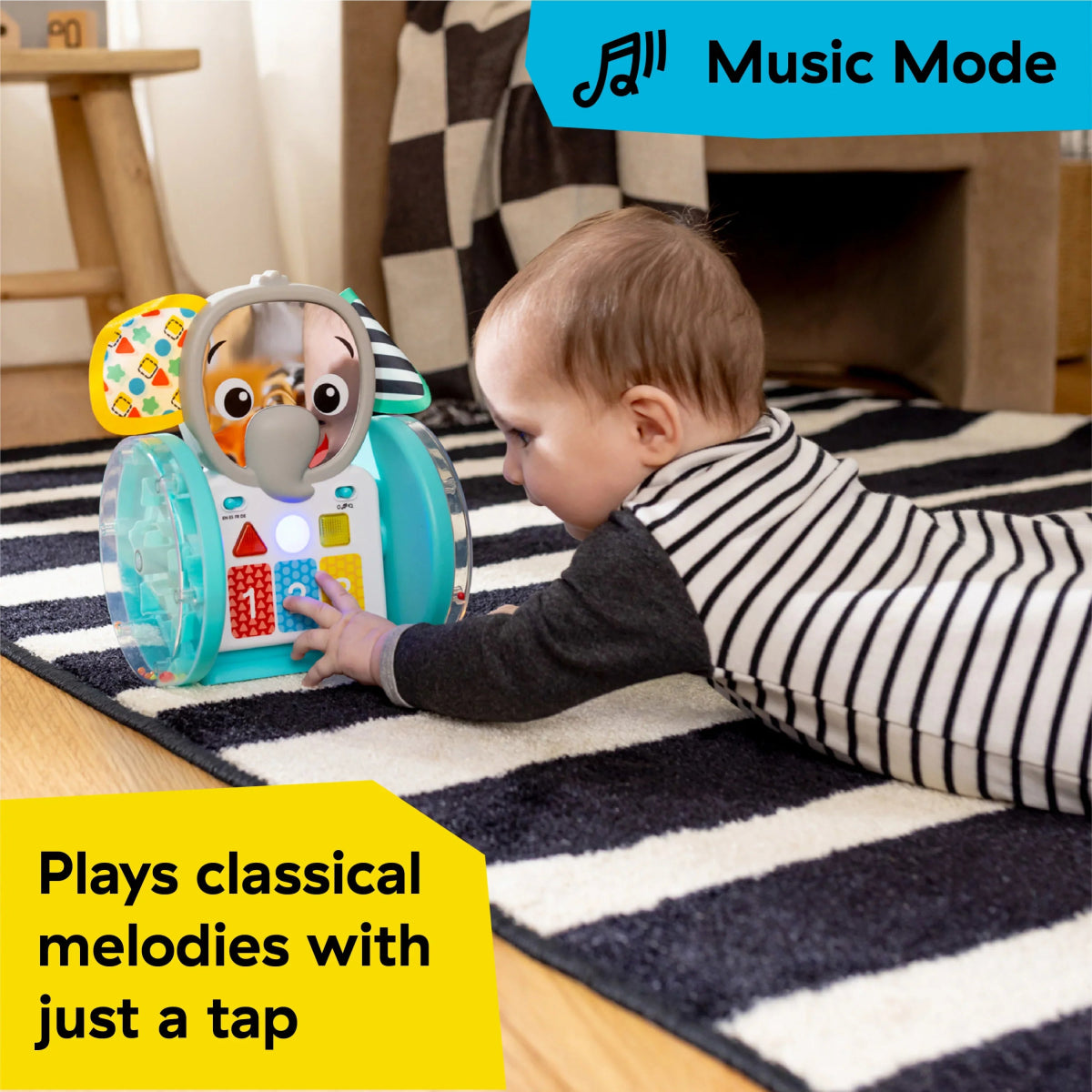 Baby on rug with turquoise elephant crawling toy, music panel and tap buttons