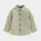 Green-and-white check button-up shirt with long sleeves and front buttons