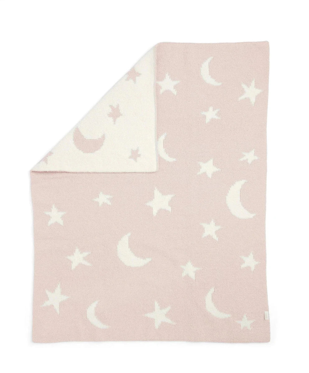 Pink chenille blanket with white stars and crescent moons, folded square