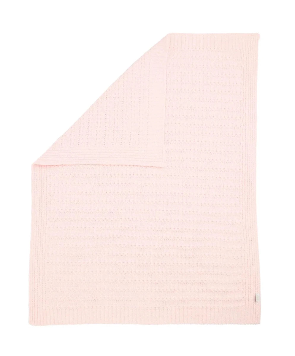 Pink chenille blanket with subtle dot-knit texture, folded