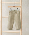 Light olive chino trousers with cuffed hem, button waist, and front pockets