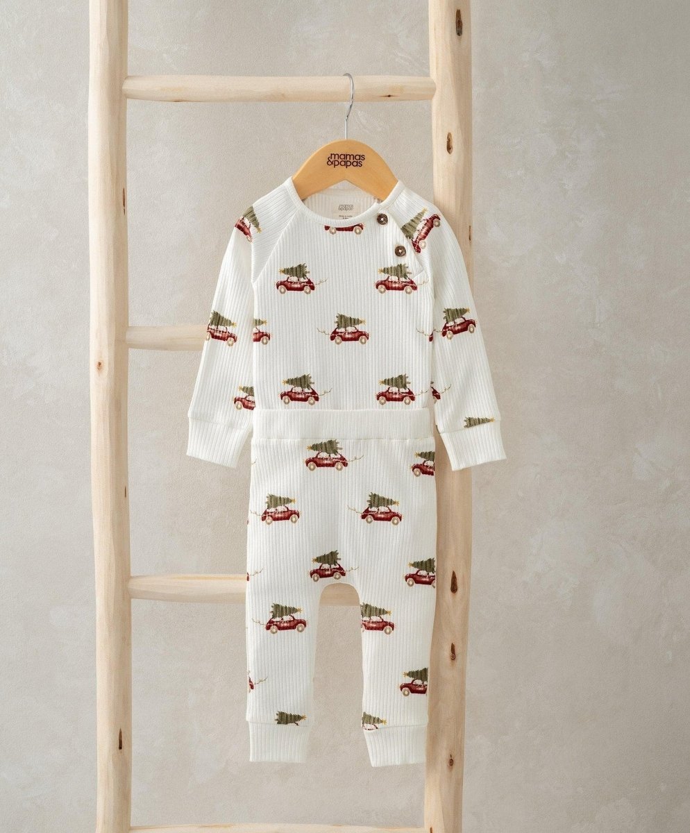 White long-sleeve car-print bodysuit with matching leggings and snap buttons