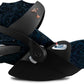 Baby car seat with dark blue patterned seat and black base, five-point harness visible