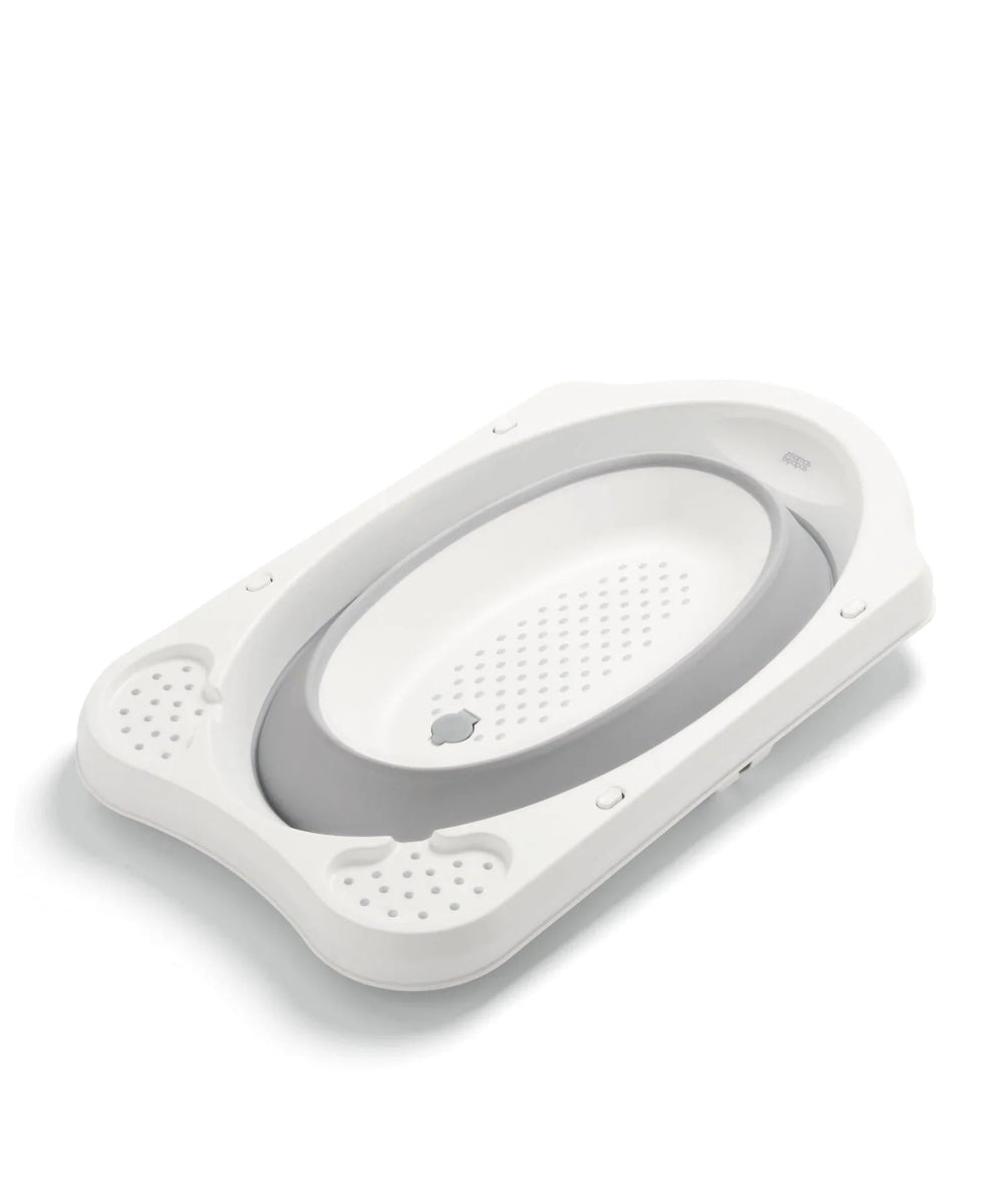 Collapsible baby bath, white rim and grey tub with perforated insert and draining holes
