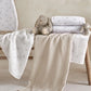 Cotbed fitted sheets set of 2 in white, small bunny pattern, on cot mattress