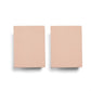 Two terracotta cotbed fitted sheets, flat folded set
