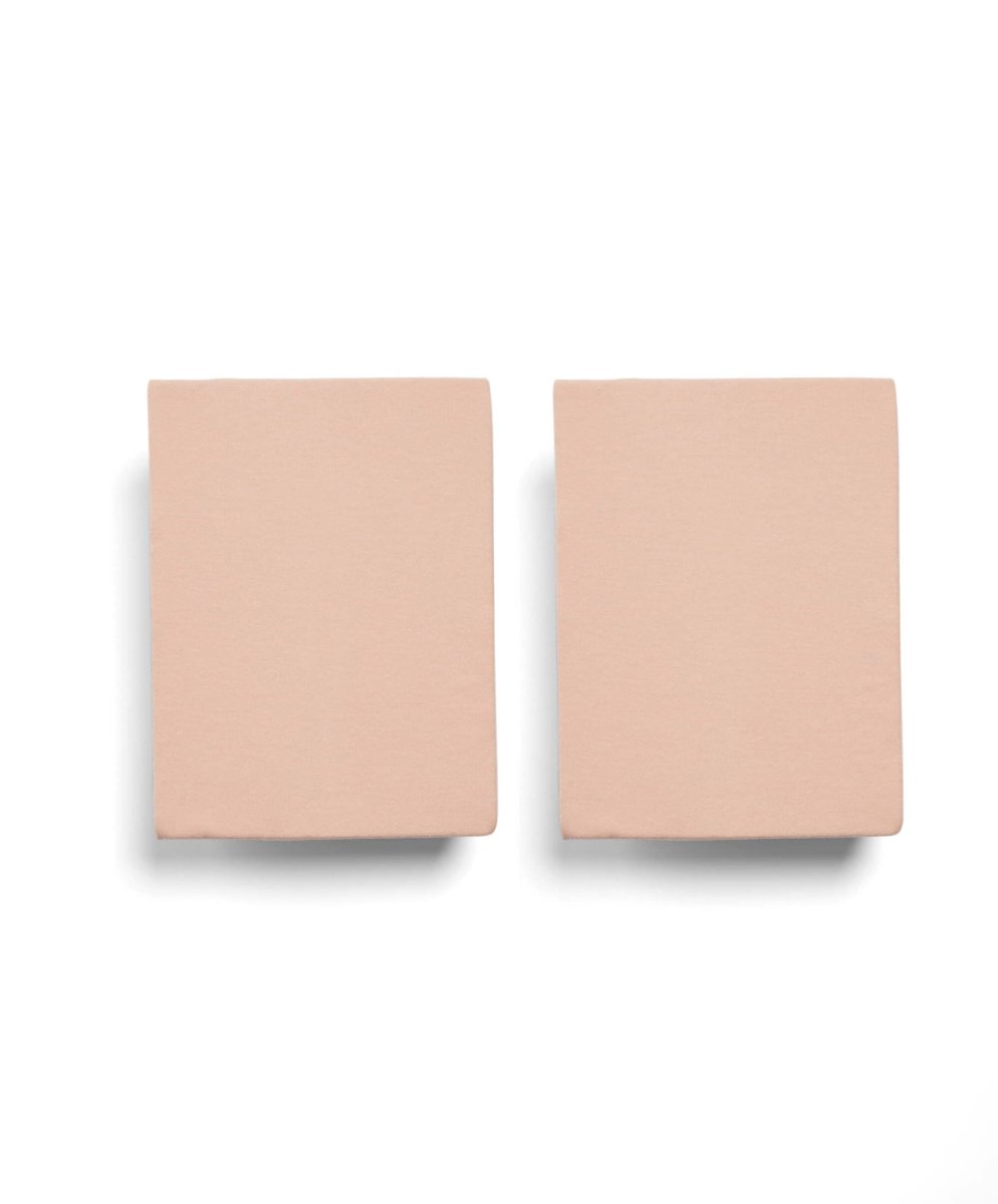 Two terracotta cotbed fitted sheets, flat folded set
