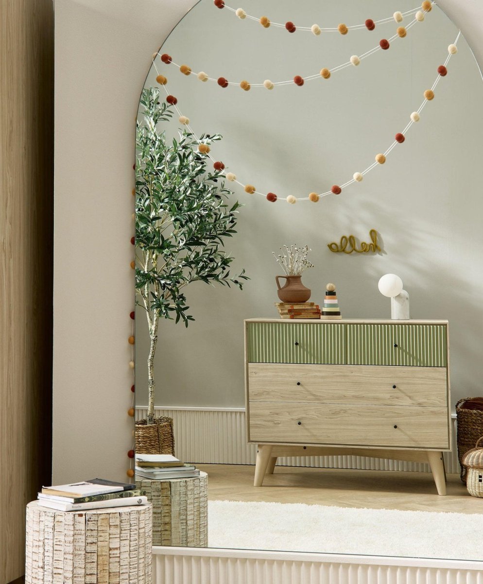 Nursery dresser changer in natural wood with olive green drawer fronts, full view