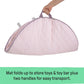 Lavender oval quilted activity mat with carry handles, folded for storage and travel