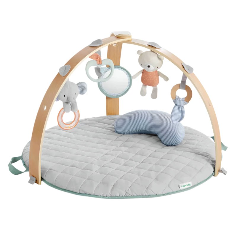 Quilted activity gym play mat with wooden arch and hanging animal toys, light gray