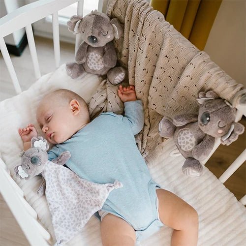 Koala plush comforter on crib blanket, gray koala face with patterned body