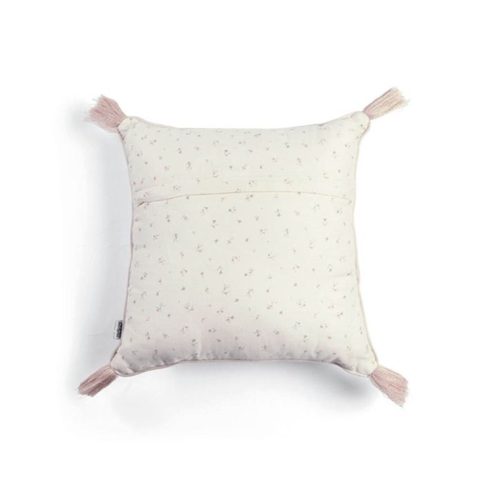 Cream square cushion with tiny floral dots and pink tassels at corners