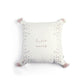 Square decorative cushion with 'hello world' embroidery, small floral print, corner tassels