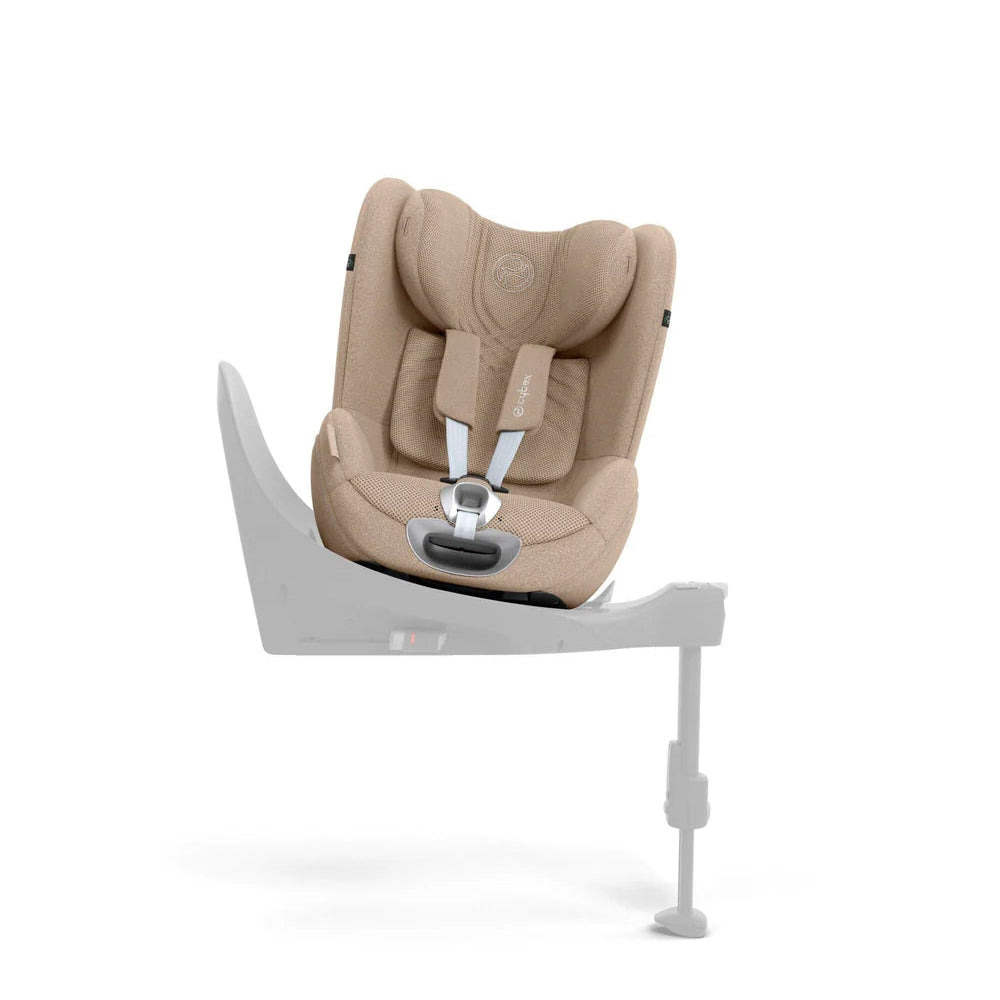Beige infant car seat with padded headrest and five-point harness