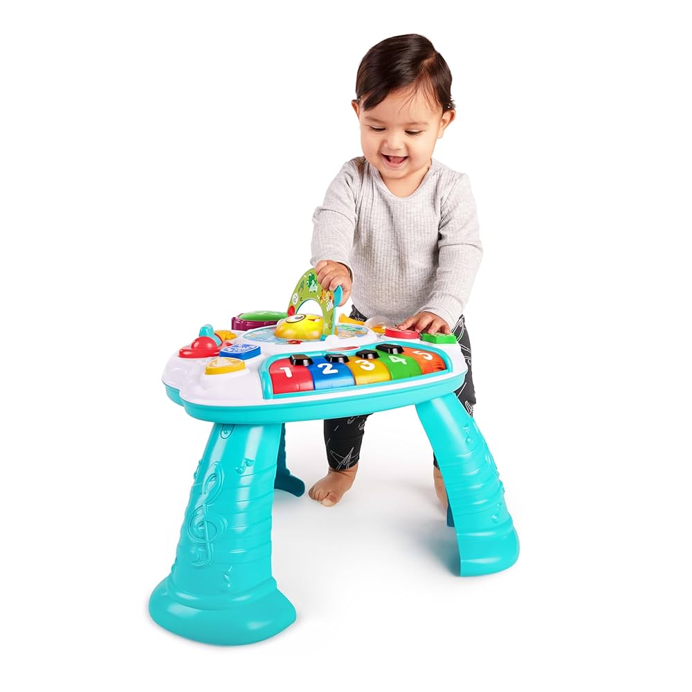 Children's activity table and floor toy with bright teal legs and musical number panel
