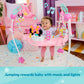 Pink Minnie Mouse baby activity jumper with hanging toys and padded seat bar