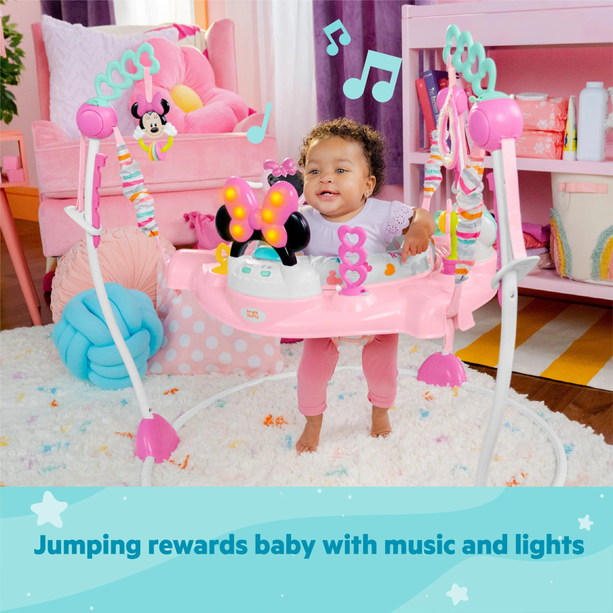Pink Minnie Mouse baby activity jumper with hanging toys and padded seat bar