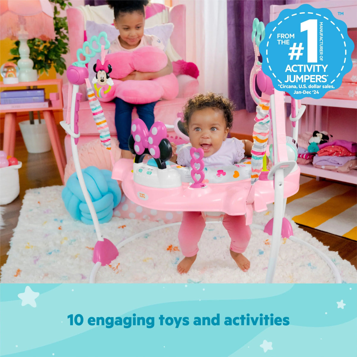Pink Minnie Mouse baby activity jumper with hanging toy arches and seat
