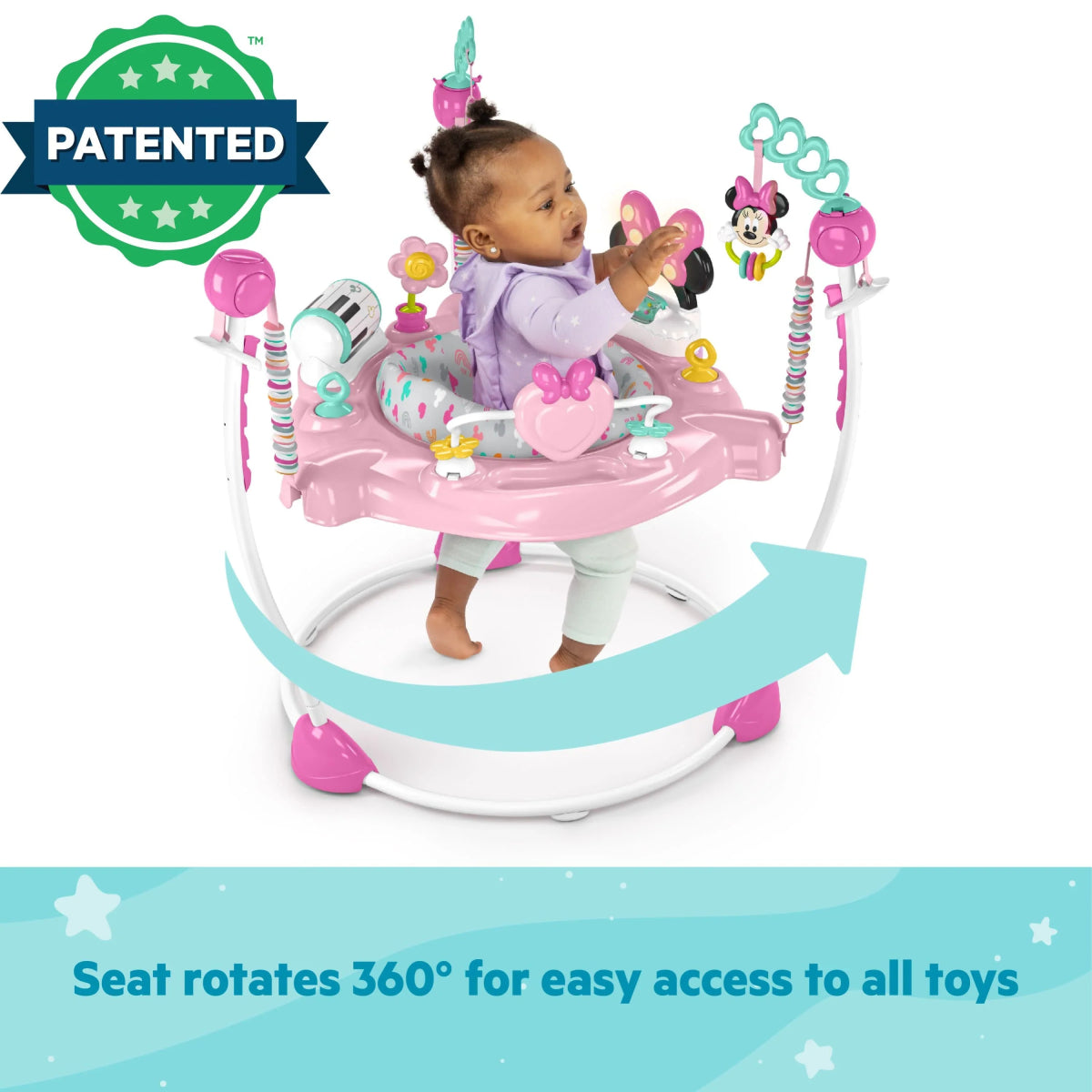 Pink baby activity jumper with Minnie Mouse-themed hanging toys and arched base
