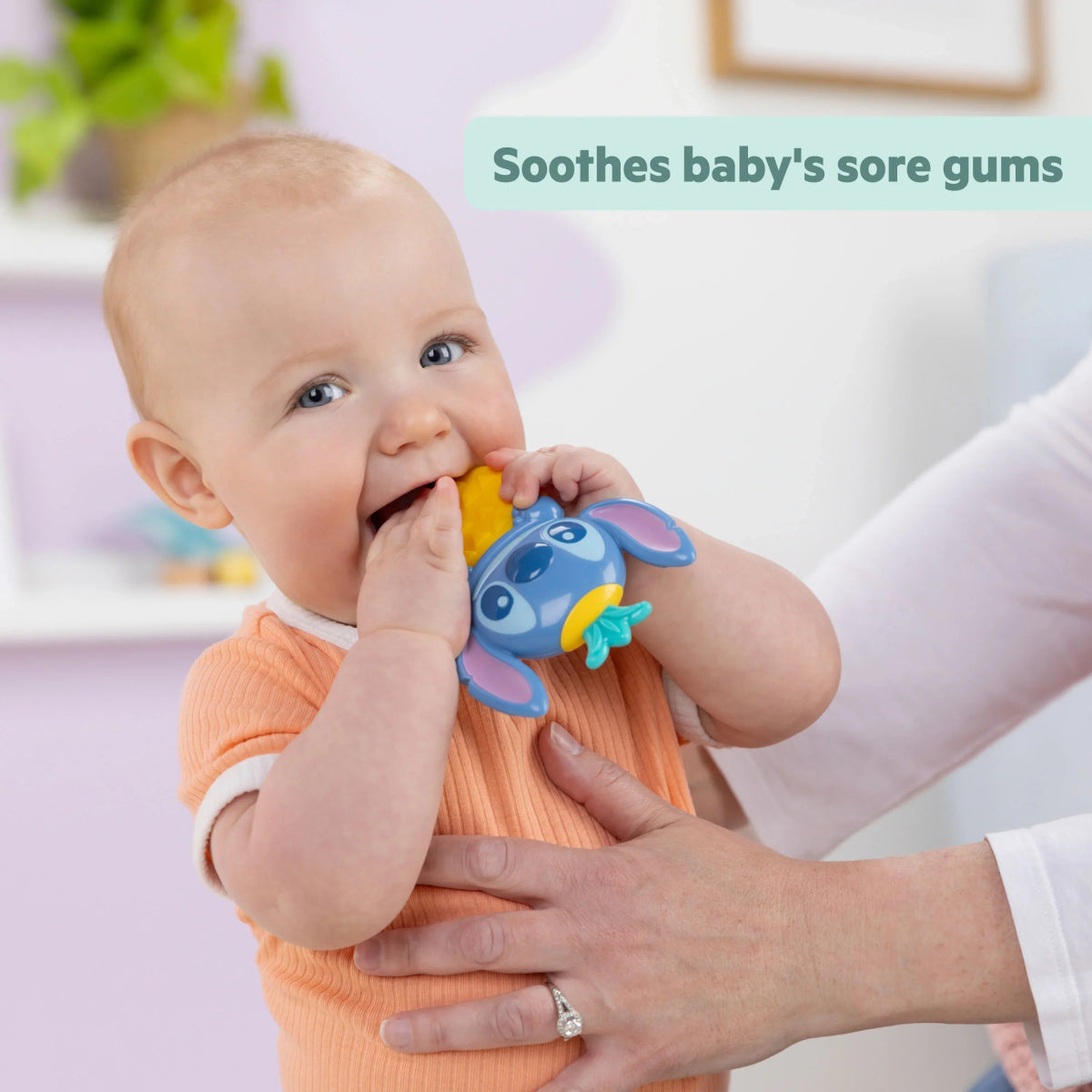 Blue Stitch teether rattle with molded sea features