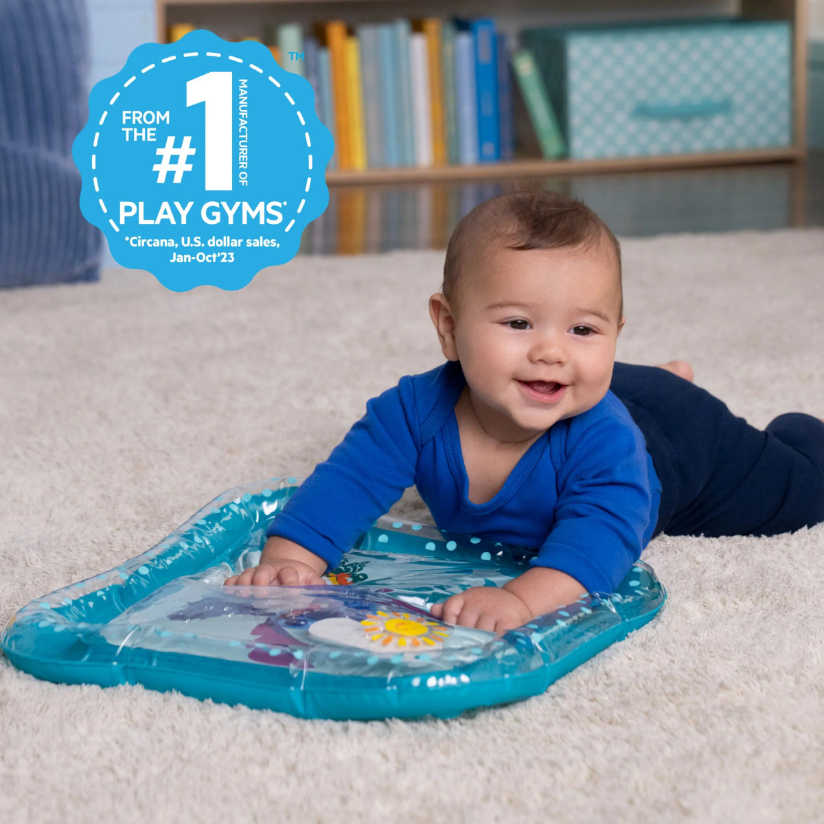 Inflatable water play mat with blue Stitch graphic, baby lying and playing