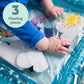 Inflatable water play mat with Stitch-themed floating pieces, close-up hands